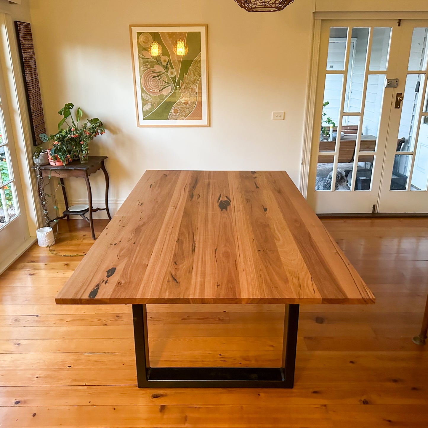 Steel Loop Legs Dining Table in Recycled Hardwood